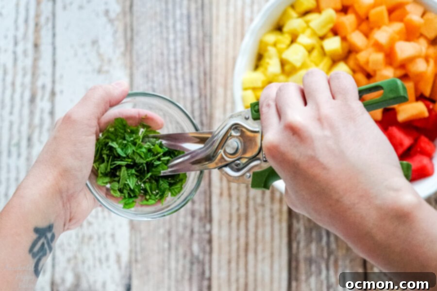 Summer Watermelon Bliss 4 Chopping the fresh mint with kitchen shears.