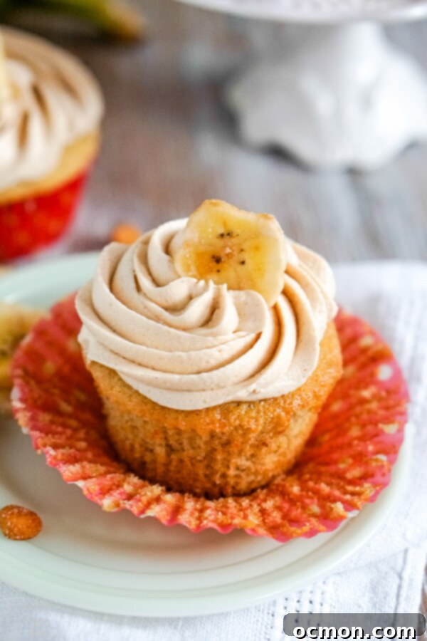 Peanut Butter Banana Bliss Cupcakes 6 Delicious Peanut Butter Banana Cupcakes with creamy frosting and a banana chip.