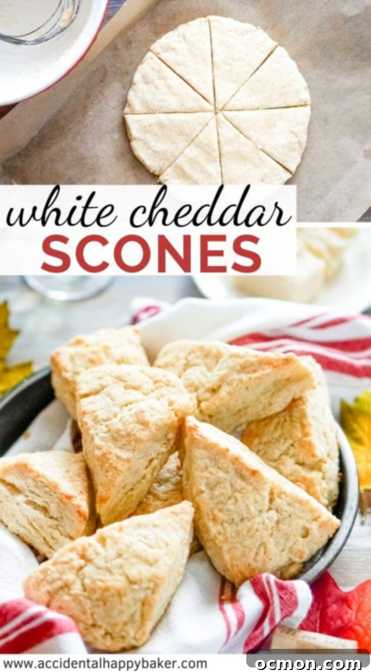 A beautifully styled shot of white cheddar scones, highlighting their cheesy, flaky texture and golden crust