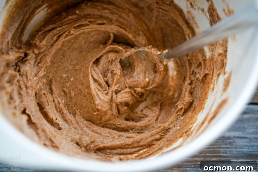 The creamy cinnamon filling is mixed together. 