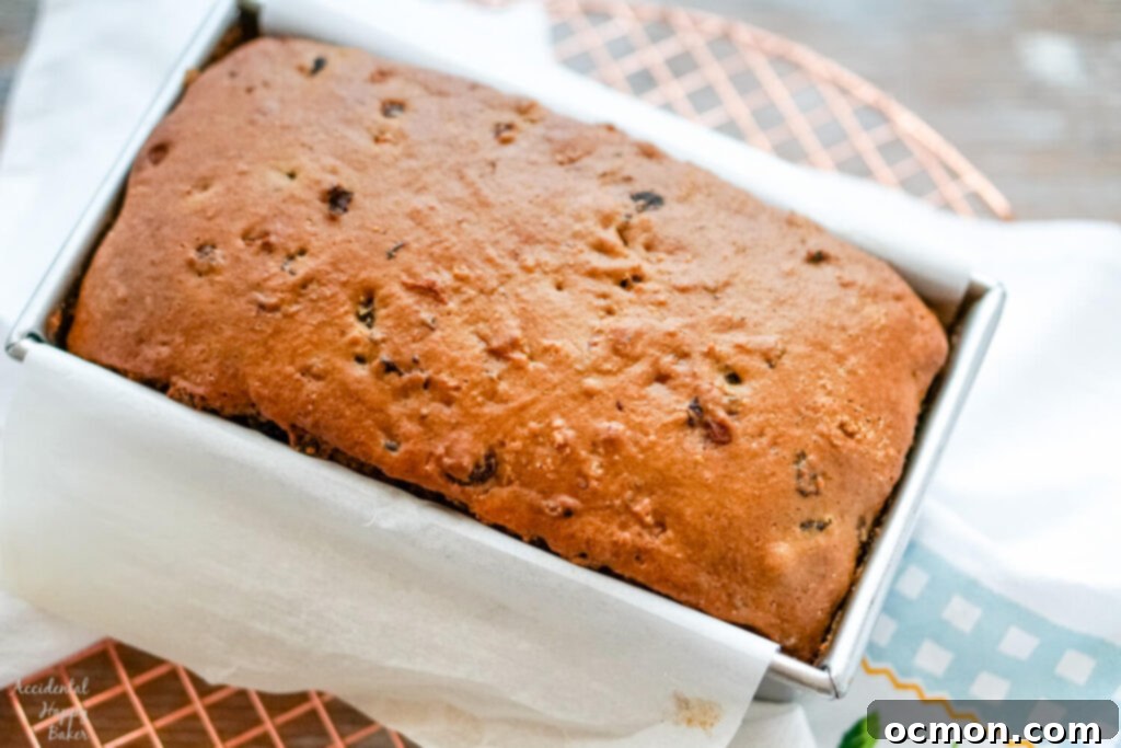 Welsh Bara Brith Tea Bread 9 Freshly baked Bara Brith cooling on a wire rack, perfectly golden brown and ready to be sliced.
