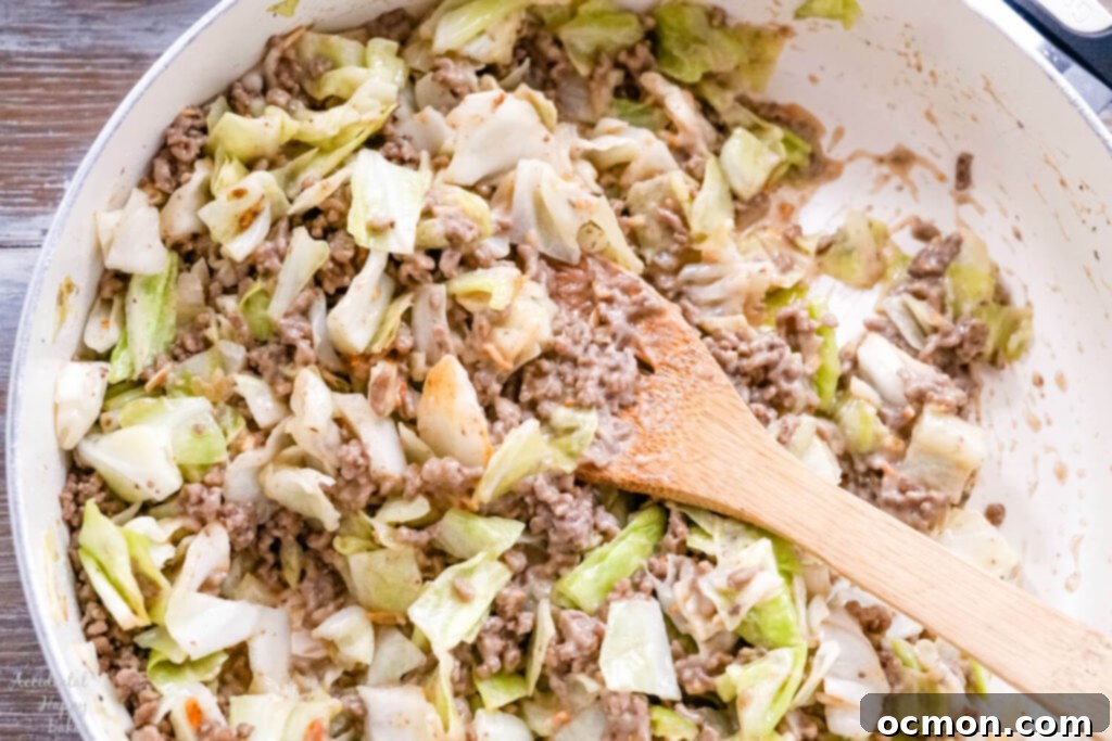 Runza Style Beef and Cabbage Bake 6 A skillet full of the ground beef and cabbage filling for the Runza casserole.