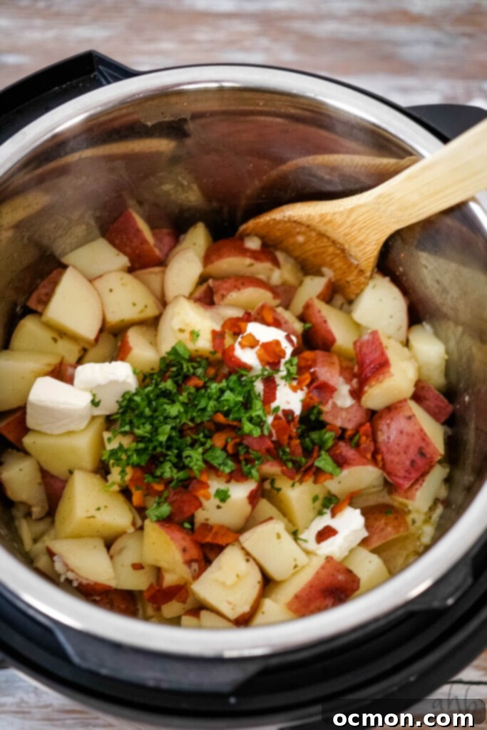 After cooking, the bacon, parsley and cream cheese are added to the instant pot. 